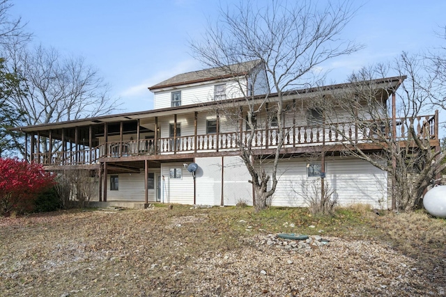 view of front facade featuring a wooden deck