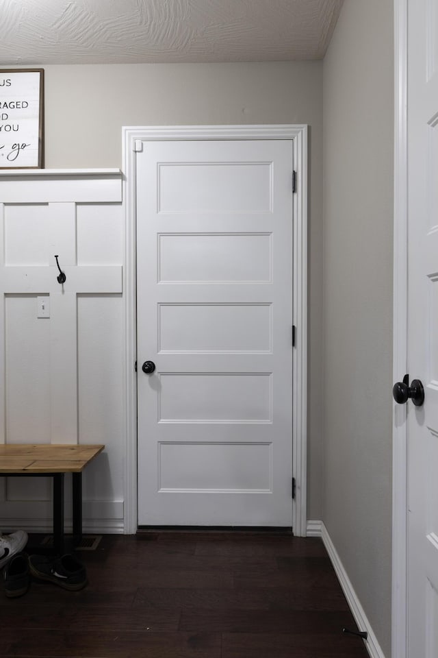 interior space with dark hardwood / wood-style floors