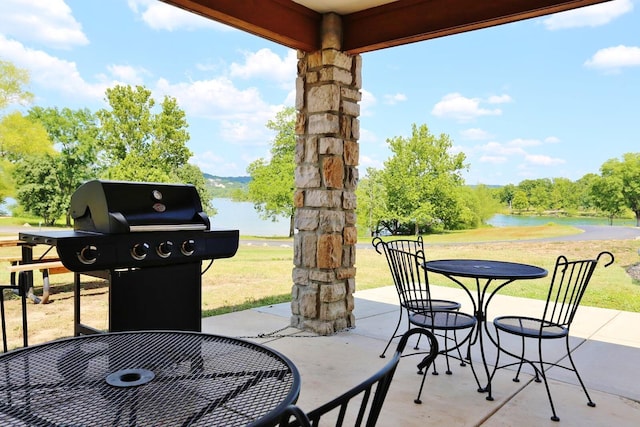 view of patio / terrace featuring a water view