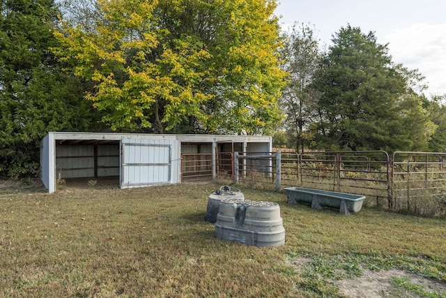 view of outdoor structure with a yard