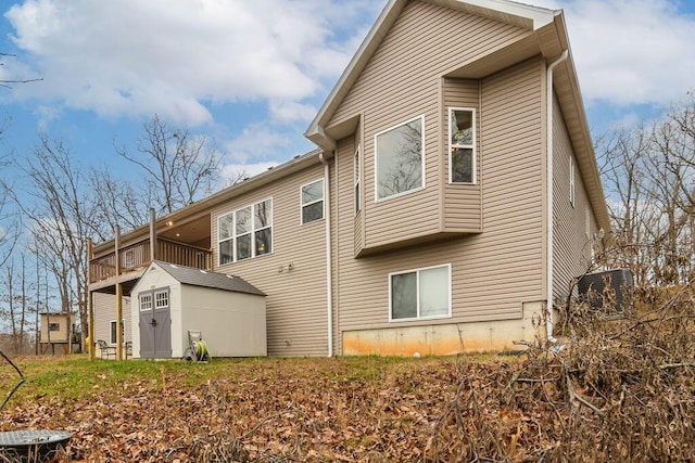 rear view of property featuring a balcony