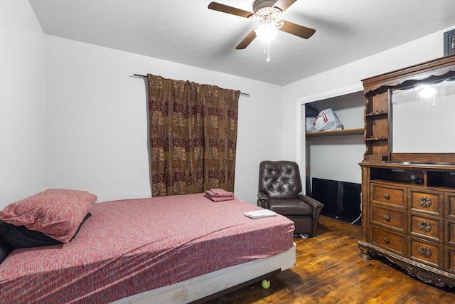 bedroom featuring dark hardwood / wood-style floors and ceiling fan