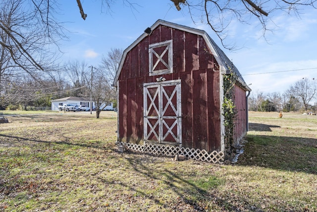 view of outdoor structure with a yard