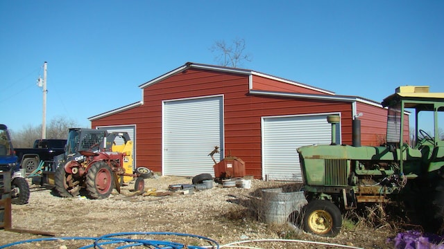 view of outbuilding with a garage