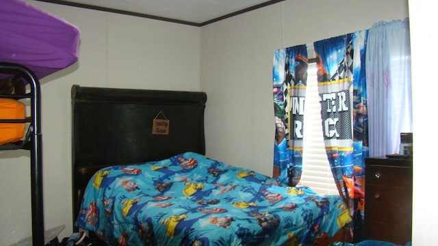 bedroom featuring ornamental molding