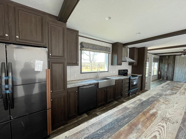 kitchen featuring sink, stainless steel fridge, dishwasher, electric range oven, and range hood