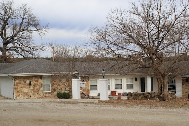 single story home featuring a garage