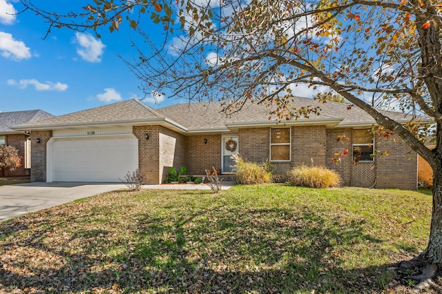 single story home featuring a garage and a front lawn