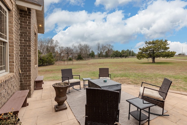 view of patio / terrace featuring a fire pit