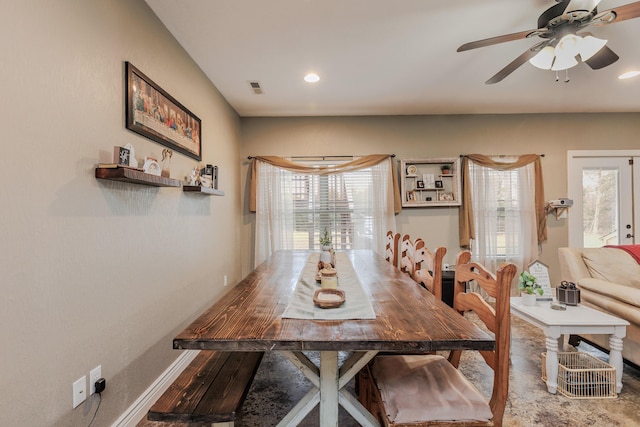 dining space with baseboards, a ceiling fan, visible vents, and recessed lighting