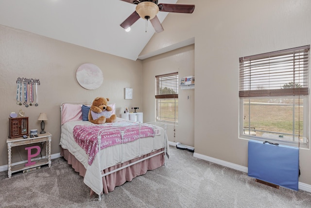 carpeted bedroom featuring a ceiling fan, lofted ceiling, visible vents, and baseboards