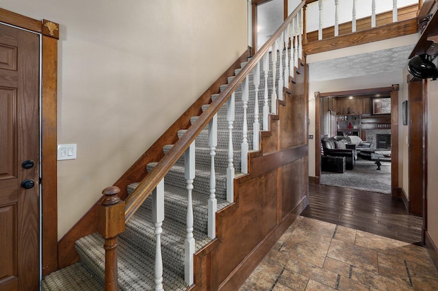 staircase featuring hardwood / wood-style floors