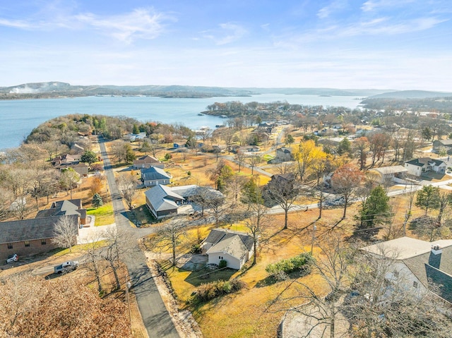 aerial view featuring a water and mountain view