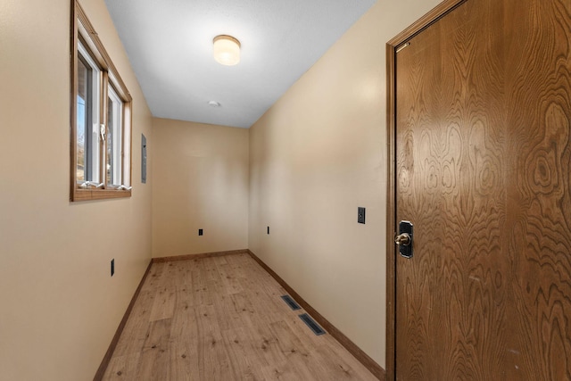 127 N Walnut St, Blue Eye, MO 65611 - hall featuring light wood-style flooring and baseboards