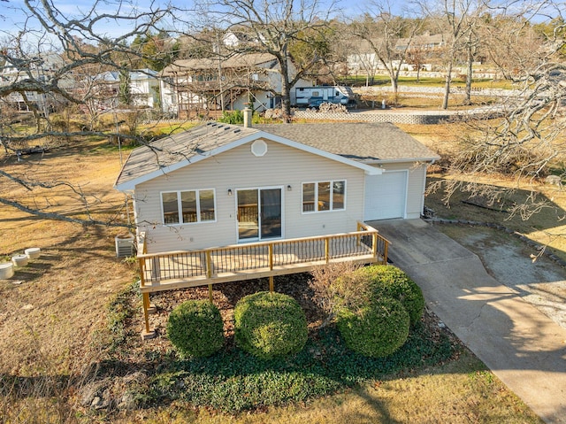 127 N Walnut St, Blue Eye, MO 65611 - ranch-style house with driveway, an attached garage, a deck, a residential view, and a shingled roof