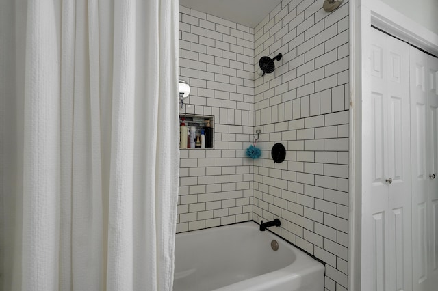 bathroom with shower / bathtub combination with curtain