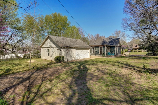 rear view of property featuring a yard