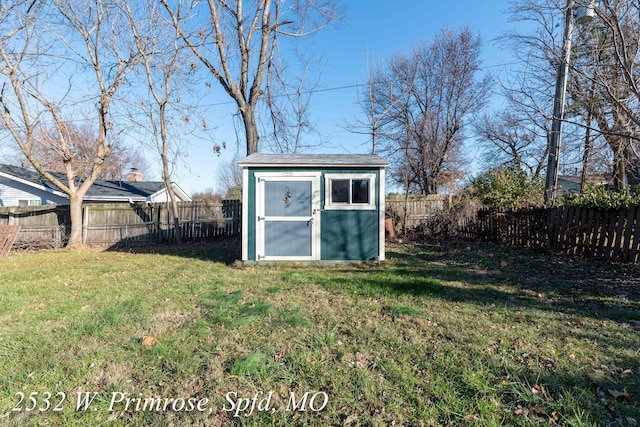 view of outdoor structure with a lawn