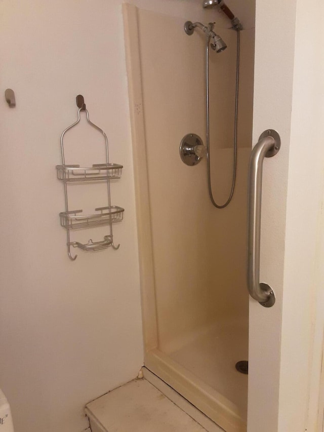 bathroom featuring walk in shower