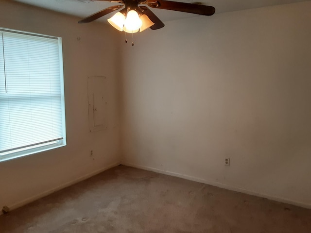 carpeted empty room with ceiling fan