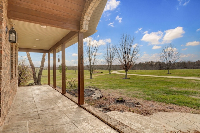 view of patio / terrace with a rural view