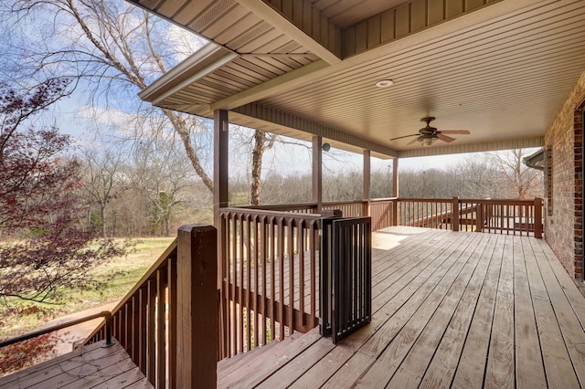 wooden deck with ceiling fan