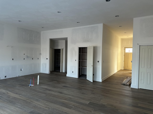 empty room featuring dark hardwood / wood-style floors