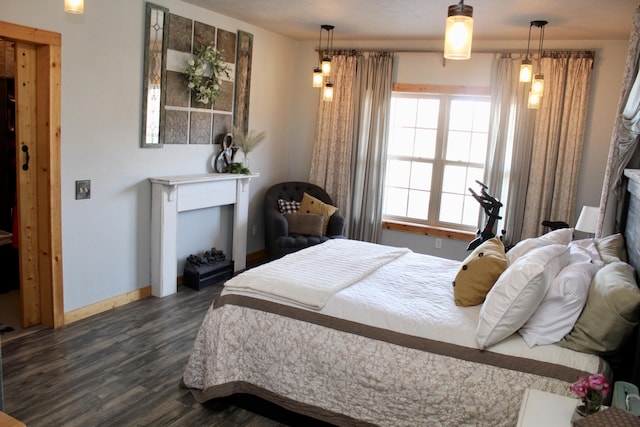 bedroom featuring dark hardwood / wood-style flooring