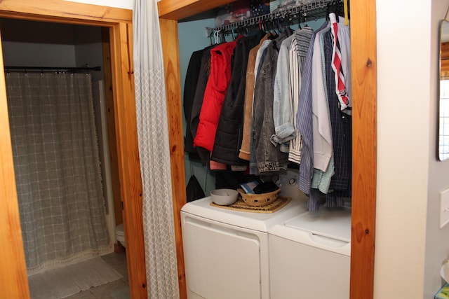 closet with washing machine and dryer