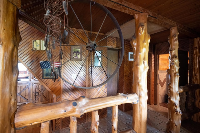 details with wood walls and wood ceiling