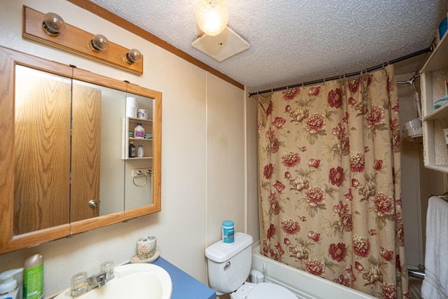 full bathroom featuring shower / bath combination with curtain, a textured ceiling, toilet, and sink