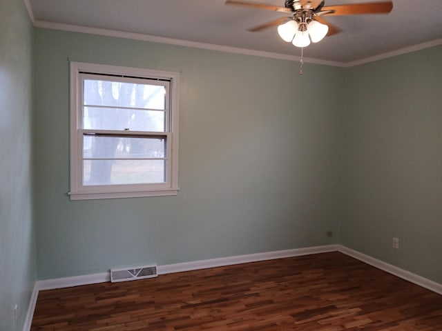 unfurnished room with ceiling fan, dark wood-type flooring, and ornamental molding