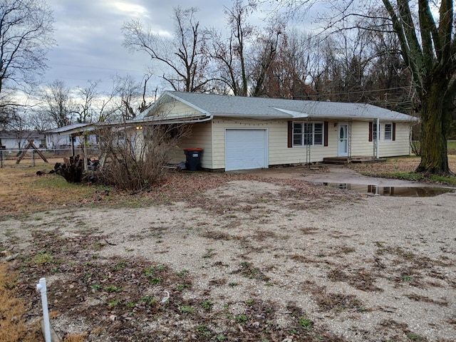 view of front of property featuring a garage