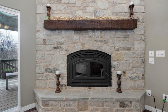 interior details featuring a wood stove