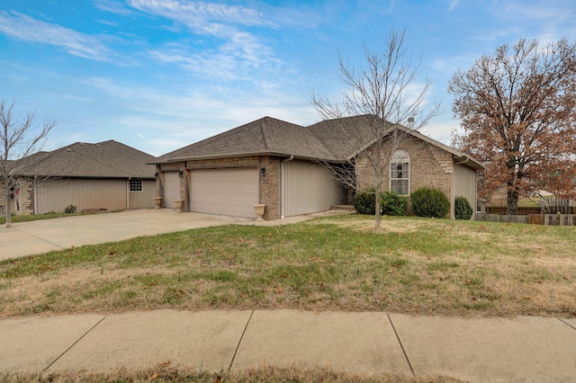 ranch-style house with a front yard and a garage