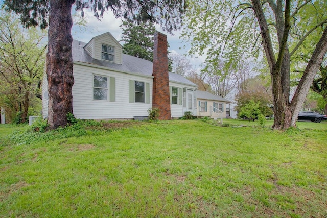 exterior space featuring a front yard