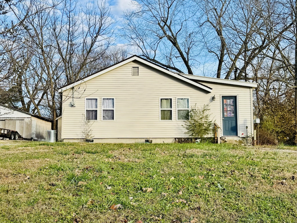 exterior space with a lawn