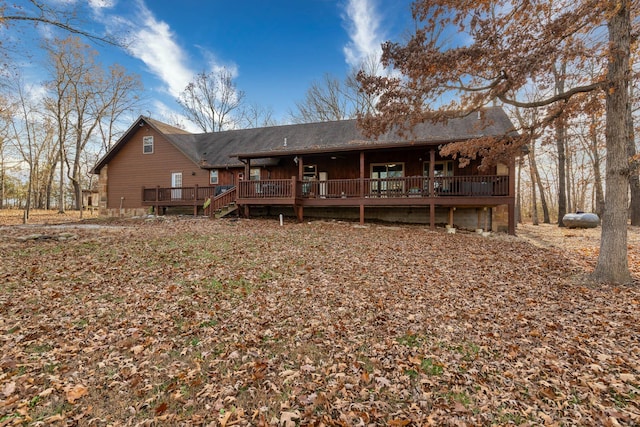 rear view of property with a deck