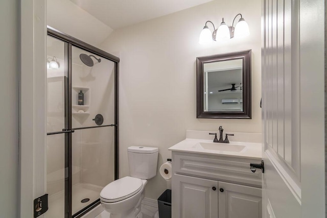 bathroom with vanity, toilet, walk in shower, and vaulted ceiling