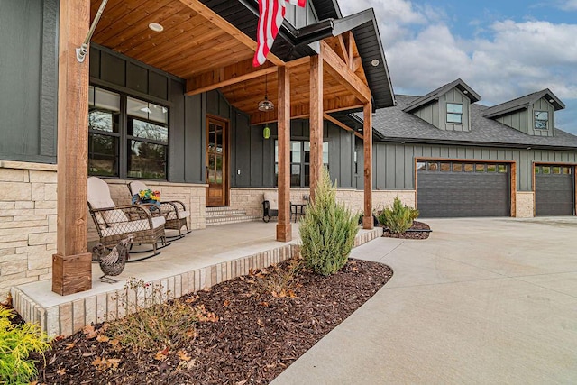 exterior space featuring a garage and covered porch