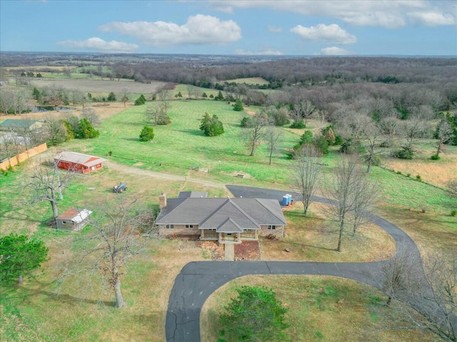 birds eye view of property featuring a rural view