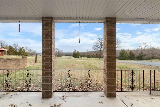 view of patio / terrace with a rural view