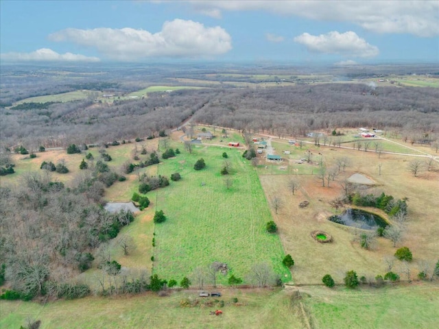 drone / aerial view with a rural view and a water view