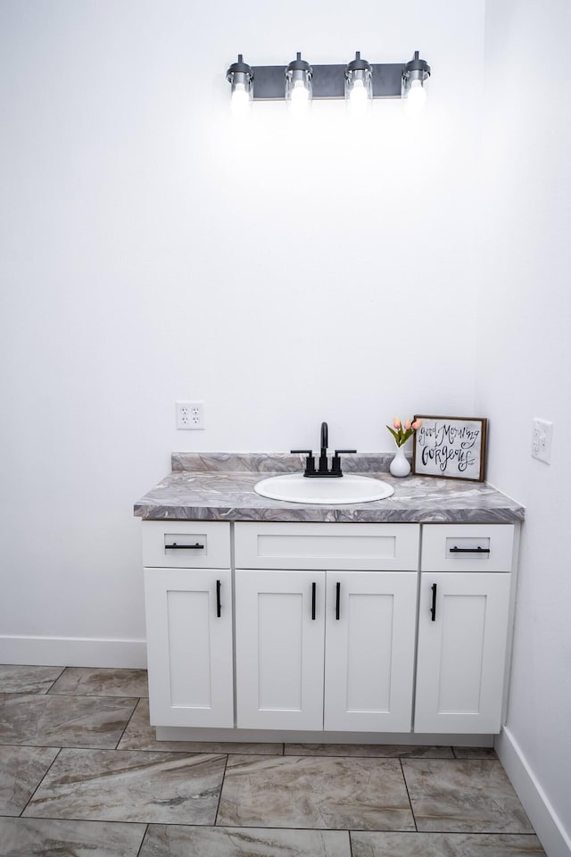 bathroom featuring vanity