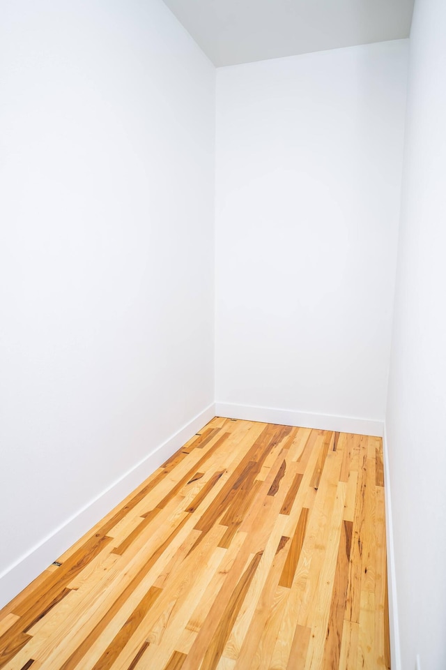 spare room featuring hardwood / wood-style floors