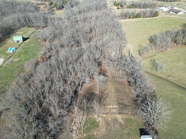 birds eye view of property featuring a rural view