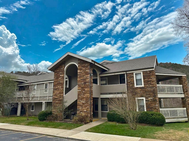 366 Wimbledon Dr Unit 10, Branson, MO 65616 - view of building exterior featuring uncovered parking