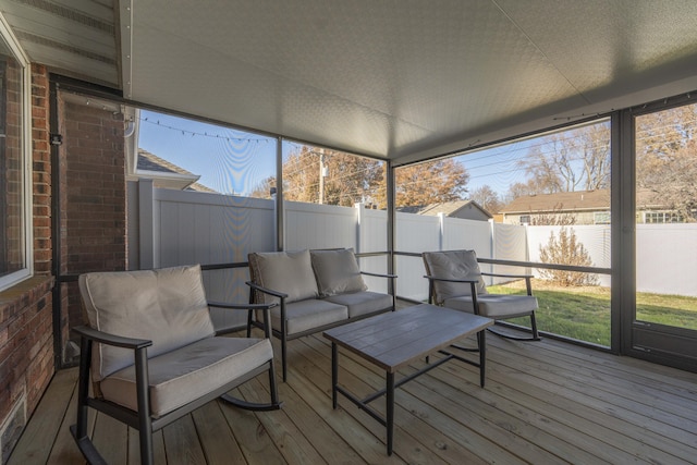 sunroom / solarium with a wealth of natural light