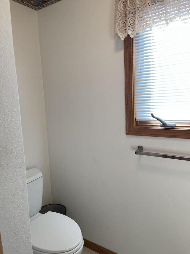 bathroom featuring toilet