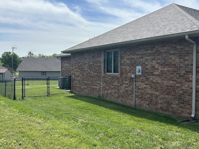 1660 S Meadow Ln, Bolivar, MO 65613 - view of side of property featuring a gate, roof with shingles, and brick siding